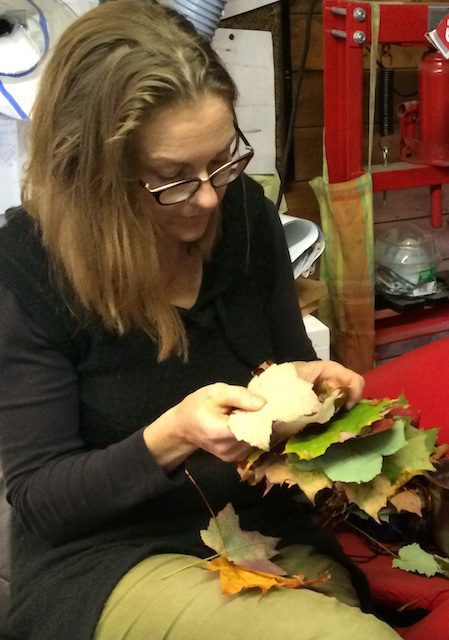 examining Maple leaves to make sterling silver rings