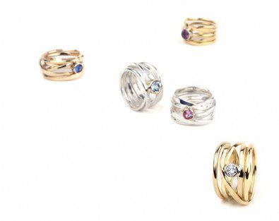 colored sapphires set in sterling silver and 18k gold rings
