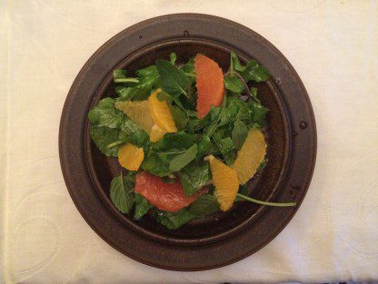 Salad with arugula and tarragon, mint, red onion,orange