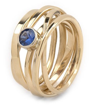 This 14k Onefooter ring is set with a dark blue sapphire. It is a size 8.5 $2,640