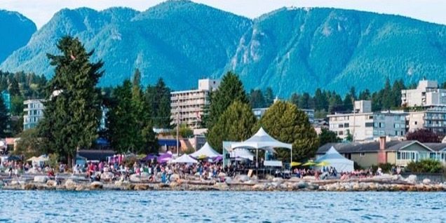 The Harmony Arts Festival site seen from the water, with the big stage tent in front