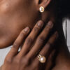 MoonPearl Editorial Featuring Ring with Kasumiga Pearl and Stud Rim Earrings in 18k Yellow Gold - by Dorothee Rosen