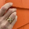 #348 Dorothee Rosen Handmade Onefooter Ring with 0.70ct Diamond in 18K Yellow Gold size 7.5 engagement ring on hand model
