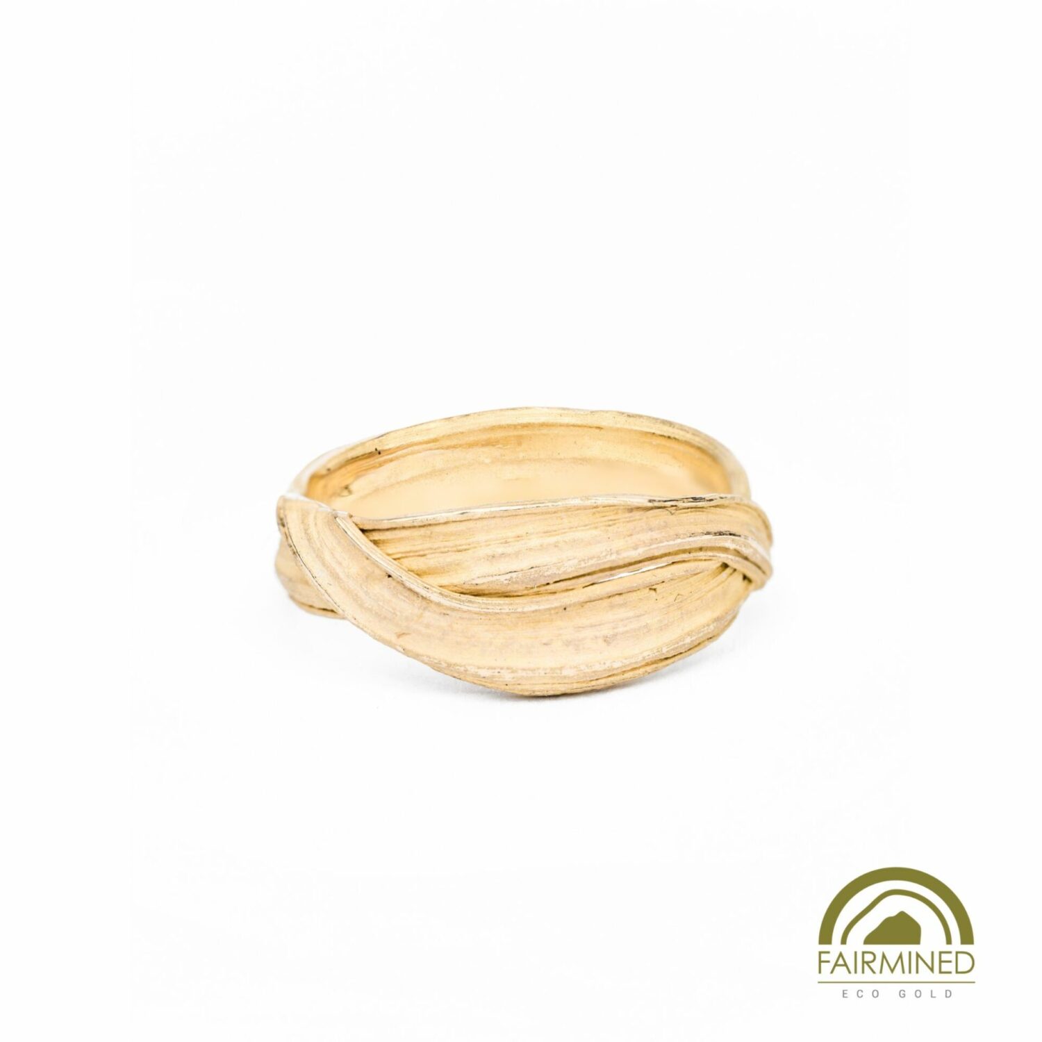ring in deep 18k yellow gold, with fabric-like texture overlapping as in contentedly crossed arms