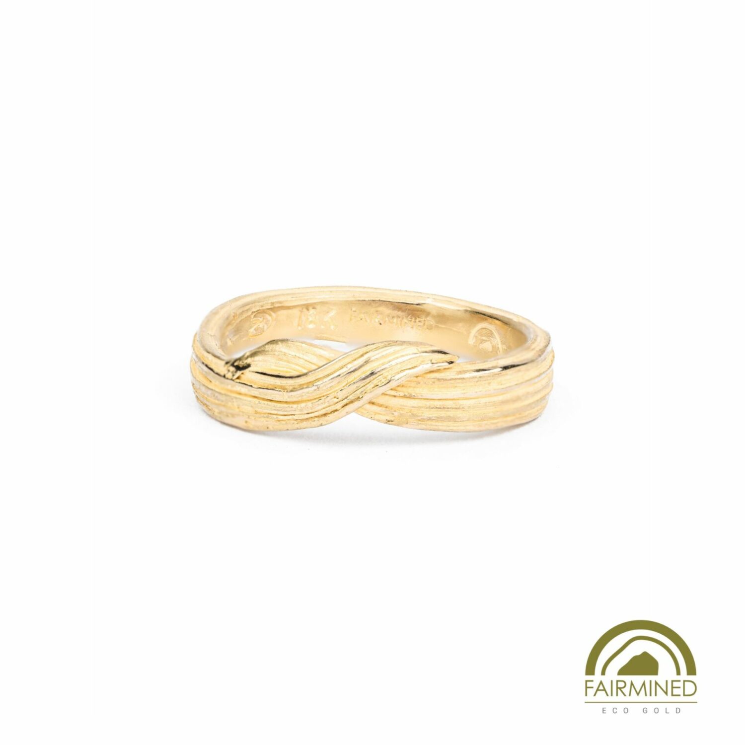 gold ring with bark-like texture, 18k yellow gold, with overlapping elements, almost like a mustach