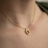 ORBIT Pendant 18ky gold BRUSHED - On Body (16 of 21) by Dorothee Rosen