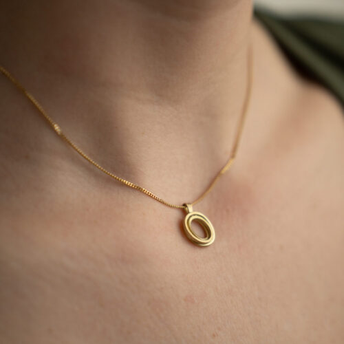 ORBIT Pendant 18ky gold BRUSHED - On Body (16 of 21) by Dorothee Rosen